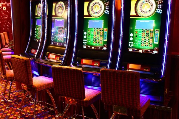 Roulette wheel spin in progress with live dealer studio environment